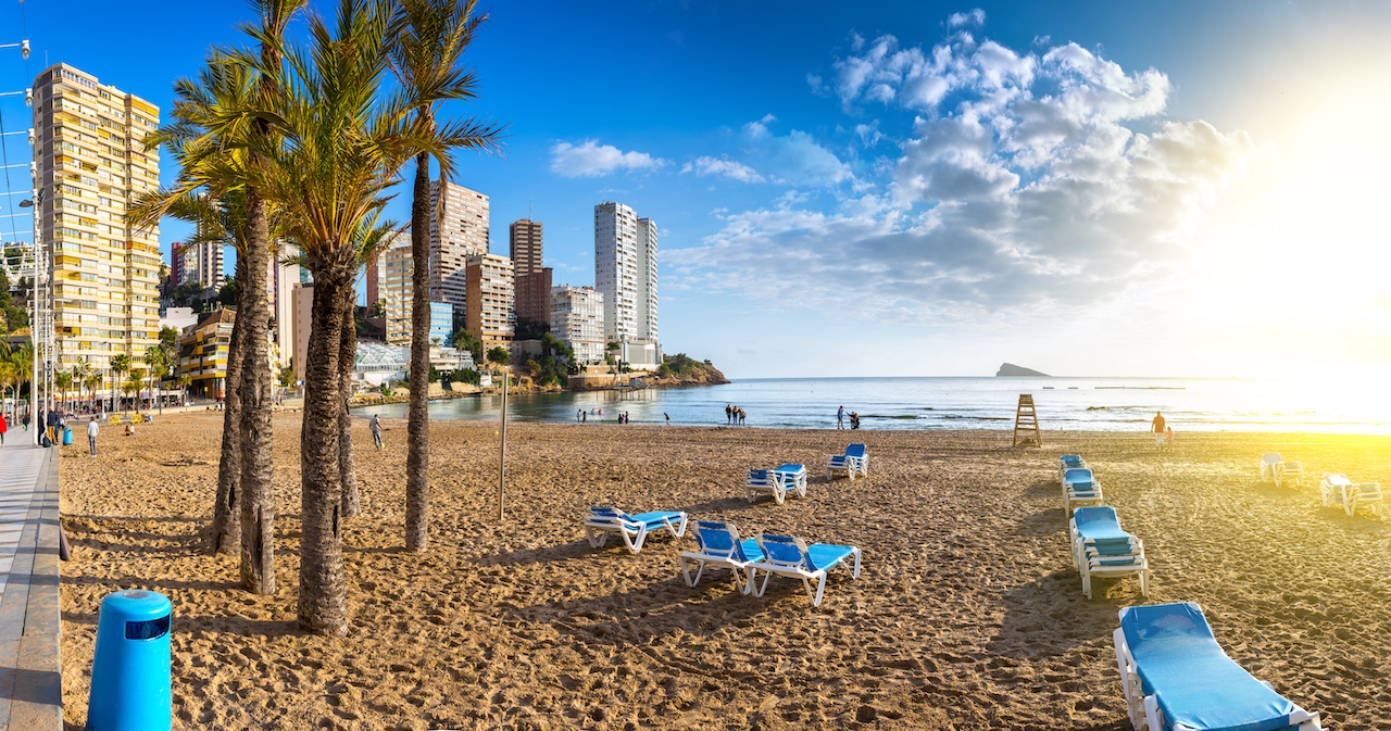 Рanoramic seascape view of summer resort with beach(Playa de Llevant) and famous skyscrapers. Costa Blanca. City of Benidorm, Alicante, Valencia, Spain.