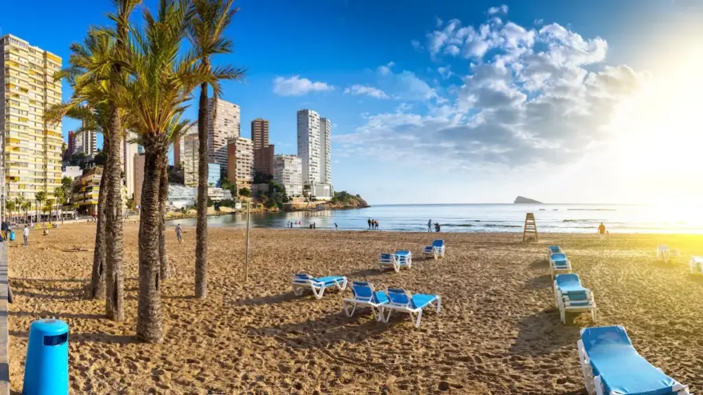 Рanoramic seascape view of summer resort with beach(Playa de Llevant) and famous skyscrapers. Costa Blanca. City of Benidorm, Alicante, Valencia, Spain.